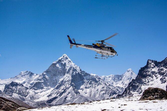 Everest Base Camp Helicopter Tour with Stop at Everest View Hotel - What to expect from the transfers, seating, and timing