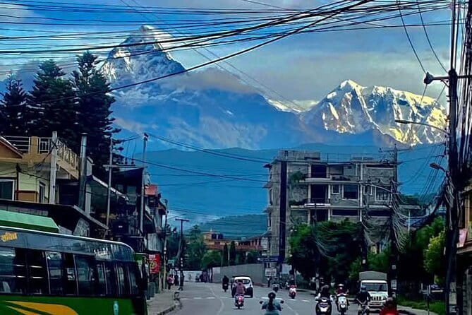 Full day Suspension Bridge, Boating, George, Sightseeing Tour - Day 1: Devi’s Fall, Gupteshwor Cave, museum learning, Bindhyabasini temple, and Phewa boating