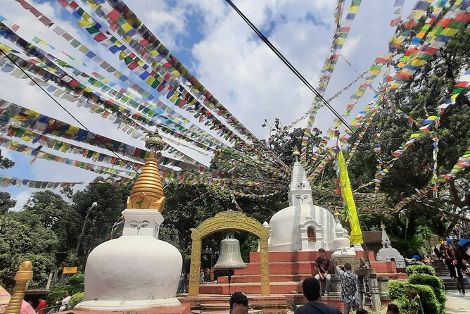 Kathmandu Top 4 or 2 UNESCO World Heritage Sites Day Tour - Swayambhunath Monkey Temple: stairs, hilltop views, and instant perspective