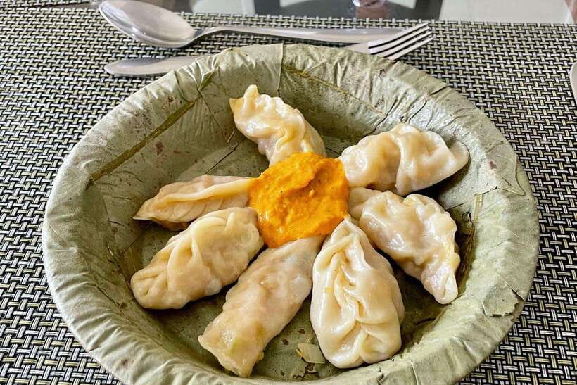 Kathmandu: Traditional Momo Making Class & Pickup - Cooking equipment, group flow, and how the class actually feels