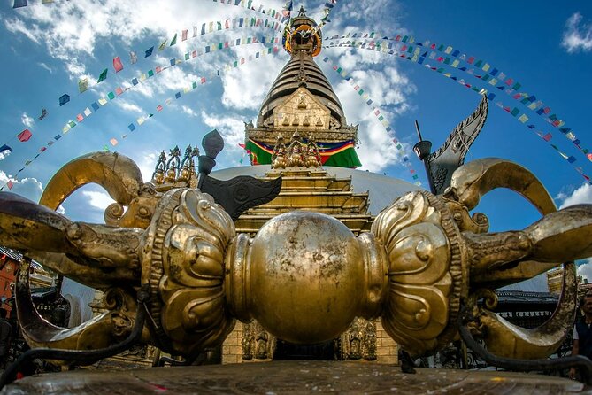 Monkey Temple - Swayambhunath Tour - Private/Small Group - World Peace Pond: a small pause with a Buddha statue and English words
